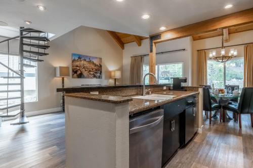 a kitchen with a sink and a counter top at Western Slope Villa 22 in Mammoth Lakes