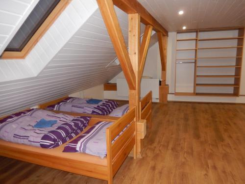 Postel nebo postele na pokoji v ubytování Apartment U Lochů