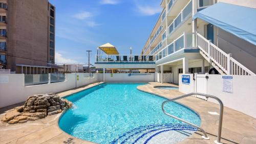 a swimming pool on the side of a building at Beachfront WW Crest Condo Sleeps 6 in Wildwood Crest