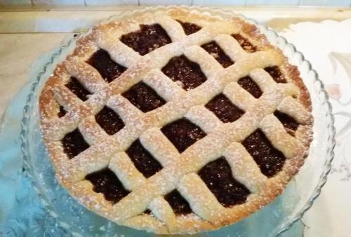 a pie sitting on a glass plate on a table at La Residenza del Marchesato in Marano Marchesato