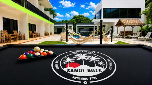 a pool table in front of a resort at Samui Hills Resort in Taling Ngam Beach