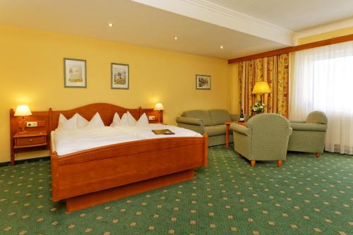 En eller flere senger på et rom på Hotel Nordkap