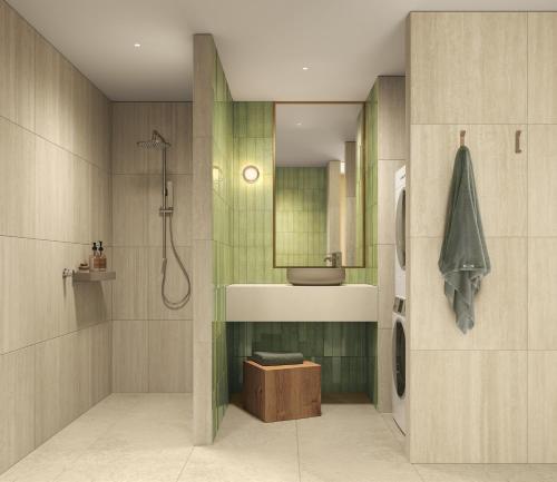 a bathroom with a shower and a sink at Oakwood Epping Melbourne in Epping