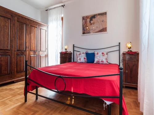 Ένα ή περισσότερα κρεβάτια σε δωμάτιο στο Casa Vacanze Calipso