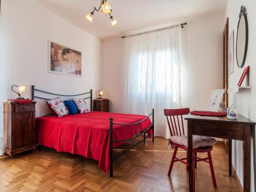 Ένα ή περισσότερα κρεβάτια σε δωμάτιο στο Casa Vacanze Calipso