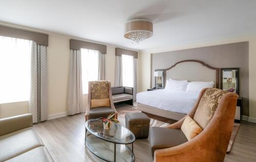 a hotel room with a bed and a table and chairs at Park South Hotel, part of JdV by Hyatt in New York