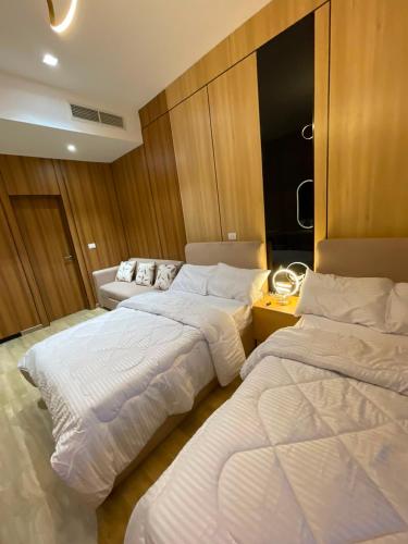 a room with two beds in a room at The Gate 05 New Alamein in El Alamein