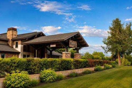 a house with a sign on the front of it at Hampton Inn By Hilton Hailey Sun Valley in Hailey