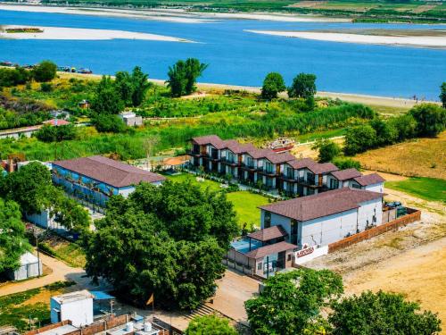 an aerial view of a resort near the water at Aayovea Resort Ayodhya Near Ram Mandir & Saryu River in Ayodhya
