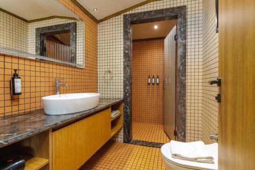 a bathroom with a sink and a toilet at Beach 222 Oludeniz in Oludeniz