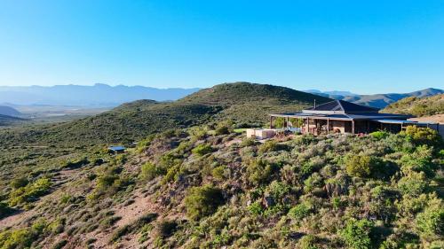 a house on top of a hill in the mountains at Eldorado TopHouse in McGregor