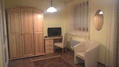 TV a/nebo společenská místnost v ubytování Pongrácz Apartman