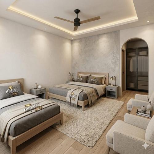 a bedroom with two beds and a couch at Ajwah Hotel Bahrain in Āīn