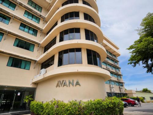 a building with theania written on the side of it at Avana Laem Chabang Boutique Hotel in Ban Laem Chabang