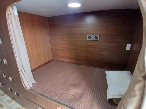 an overhead view of a small room with wooden walls at Nhà nghỉ Homestay Minh Hạnh in Nà Phia