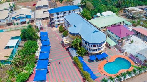 an overhead view of a resort with a swimming pool at GLAMOSSAY HOTEL LIMITED SUNYANi in Abesem