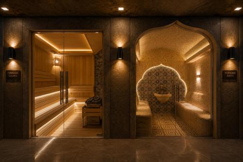 an entrance to a room with a bathroom with a mirror at The Wood Hotel & Spa near Magic City in Tashkent