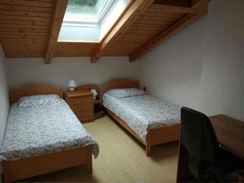 Postel nebo postele na pokoji v ubytování Apartment Lapanja