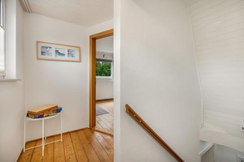 a hallway of a house with a door leading into a room at Ferienhaus nahe Uni Lueneburg in Lüneburg
