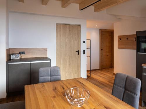 a dining room with a table and chairs at Apartment Miramonte-6 by Interhome in Kappl