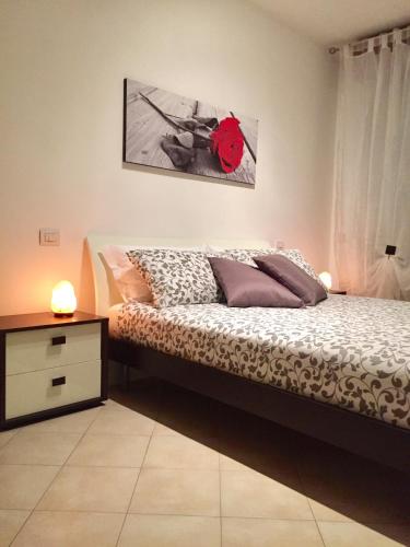 Cama o camas de una habitación en Appartamento I Girasoli
