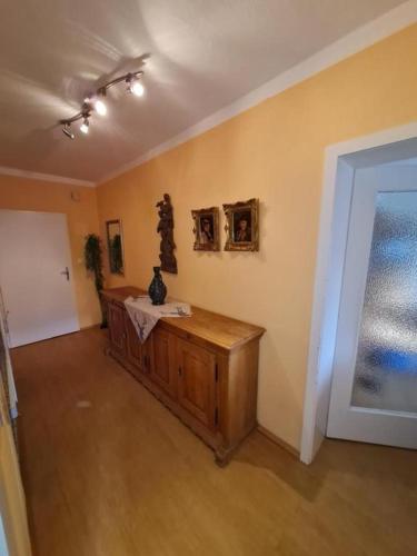 a room with a wooden table in a room at Appartement THERESE by MoniCare in Seefeld in Tirol