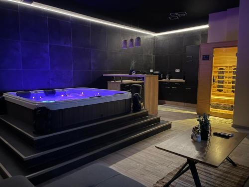 a large bathroom with a jacuzzi tub at Ancram SPA Miskolc in Miskolc