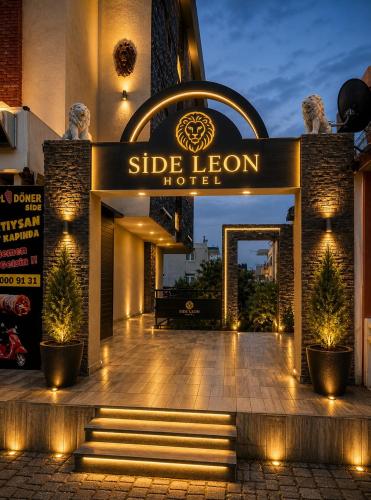a hotel entrance with a sign that reads side les hotel at Green Side Leon Hotel in Side