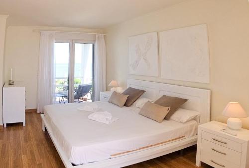 La casita frente al mar con jardín by costablancarent