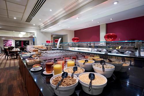 a buffet line with a lot of food at Orida Maidstone in Maidstone