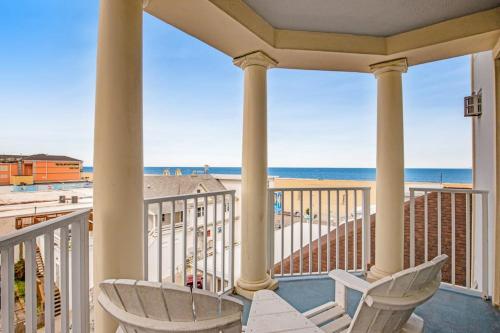 a view of the beach from the balcony of a beach house at Belmont Towers 407 in Ocean City