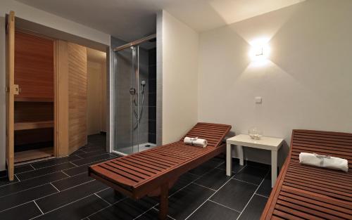 Postel nebo postele na pokoji v ubytování Apartmány Anna s bazénem a welness