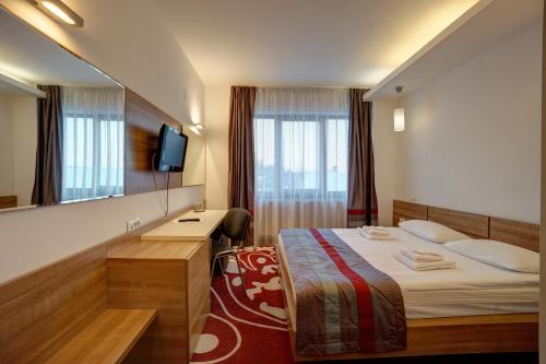 Μια τηλεόραση ή/και κέντρο ψυχαγωγίας στο Hotel Ave Lux