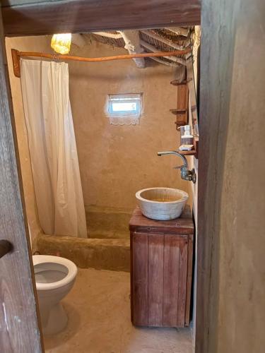 a bathroom with a sink and a toilet at Hobbit-Hole in Siwa in Siwa