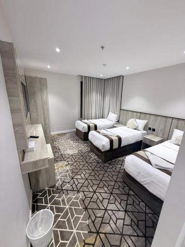 a hotel room with two beds at Ritaj Al-Tala'i in Mecca