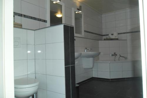 ห้องน้ำของ Herkenhoek 3 bedroom apartement
