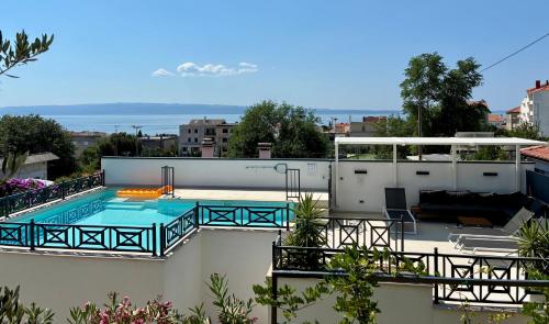 a swimming pool on the roof of a house at Luxury house Prestige Split in Split