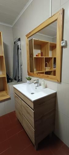 a bathroom with a sink and a mirror at Villa Visconde in Nordeste