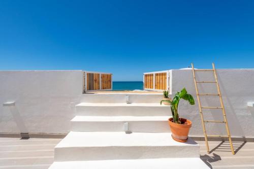 Two beachfront semi detached villas on the sand