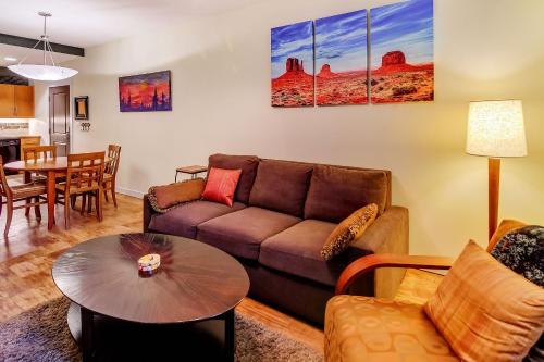 a living room with a couch and a table at Fraser Crossing 3127 in Winter Park