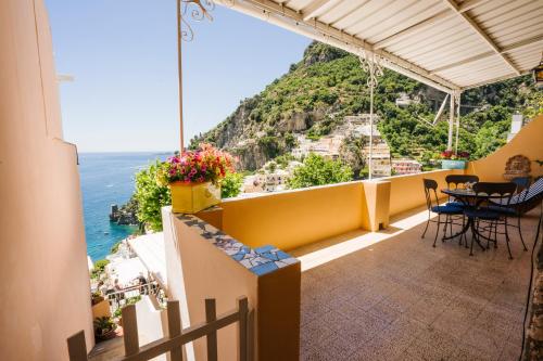 a balcony with a view of the amalfi coast at Villa Setteventi in Positano