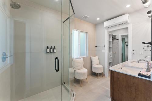 a bathroom with a shower and a sink at Charming house in Midtown District in Reno