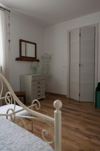 Agriturismo Scribanoにあるベッド