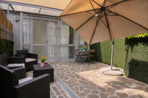 Modern Apartment with Private Patio near Navigli & Bocconi