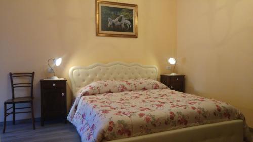 A bed or beds in a room at Al Pic de Corone