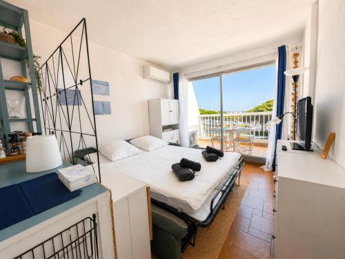 Studio cabine terrasse et parking vue port