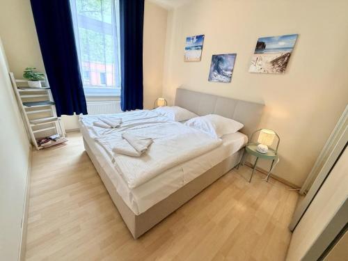 a bedroom with a bed in a room at WarneSonne in Warnemünde