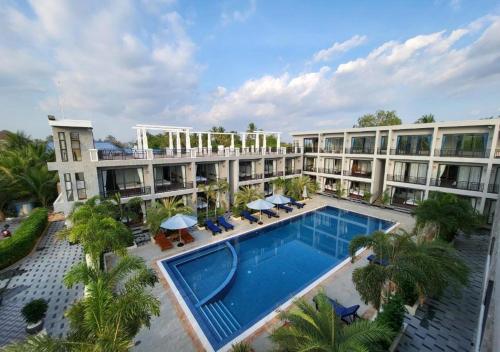 an aerial view of a hotel with a swimming pool at Khemra Boutique in Kampot in Kampot
