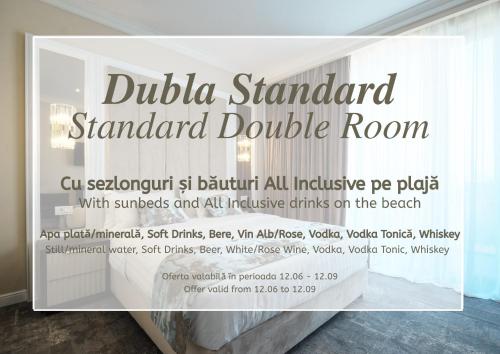 a sign for the dudida standard standard double room at Panoramic Mamaia Hotel in Mamaia