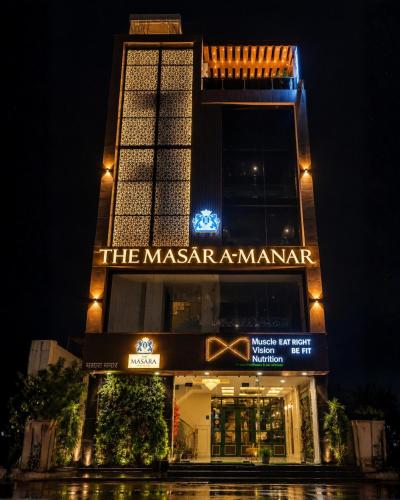 a building with a sign that reads the masari am istg at THE MASARA MANAR Hotel in Gwalior